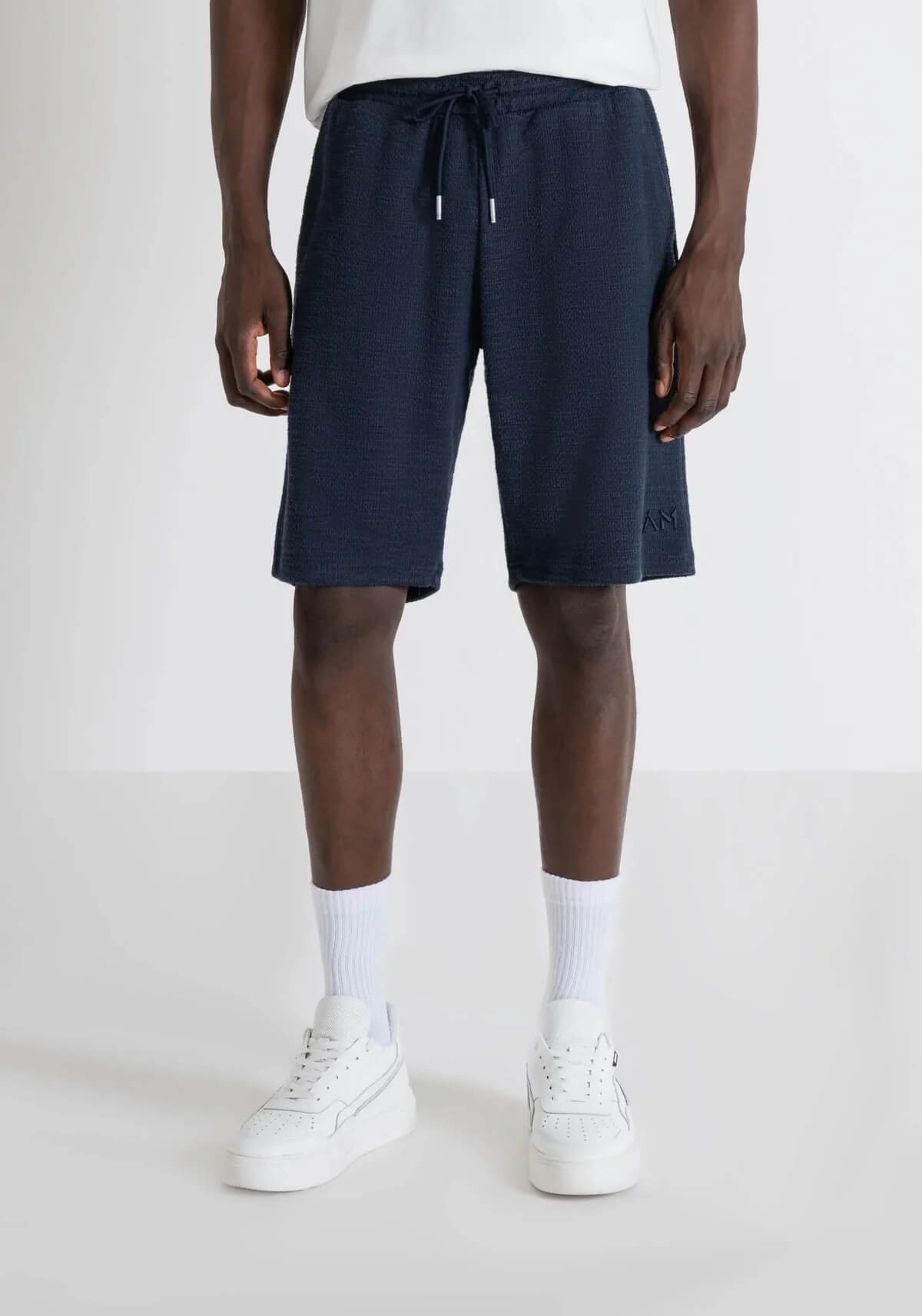 Pantaloneta deportiva de hombre con forro polar