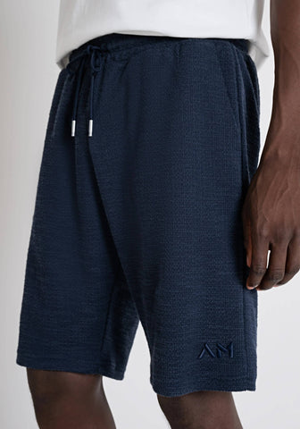 Pantaloneta deportiva de hombre con forro polar